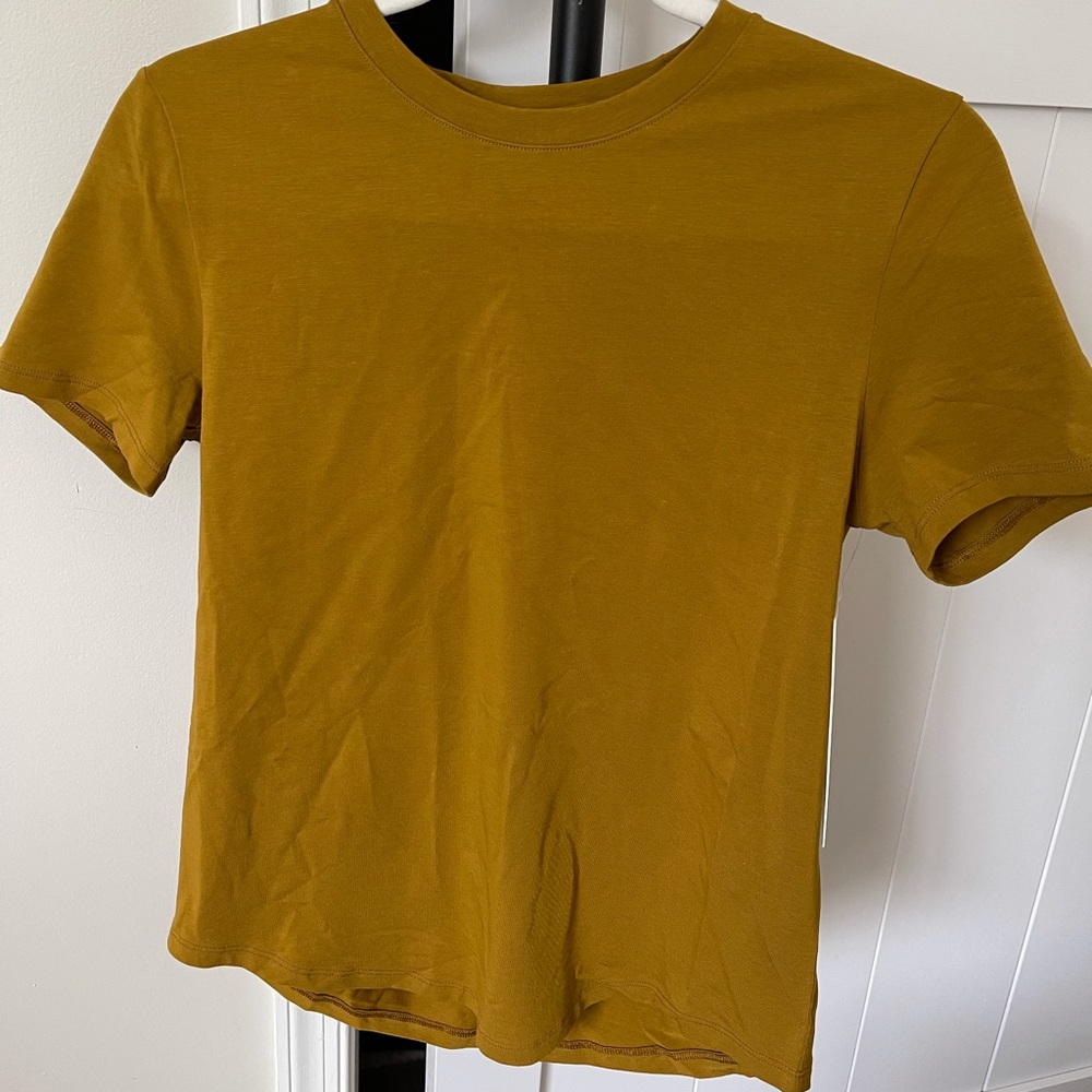 Lululemon Love Crew in gold spice with tags.